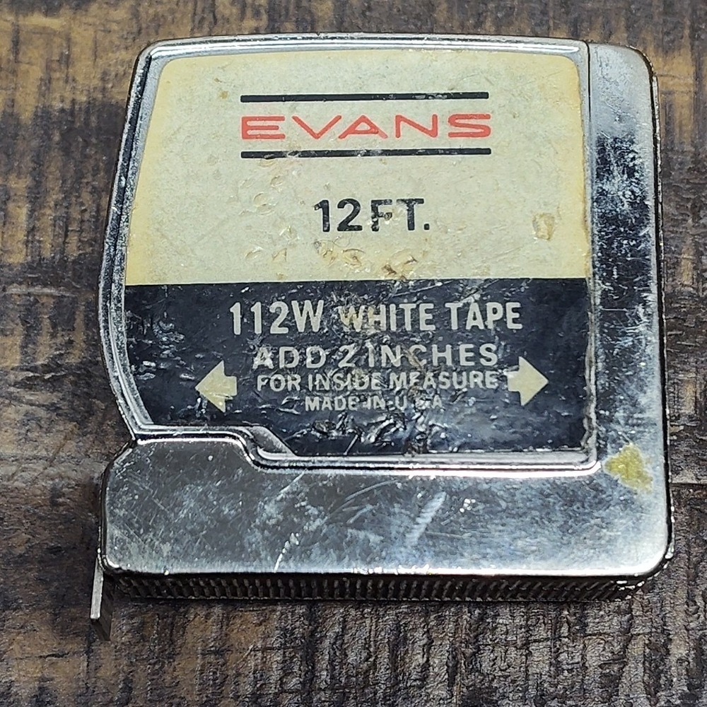 Vintage Evans 12 Ft Measuring tape made in the USA 2"X2"X1"